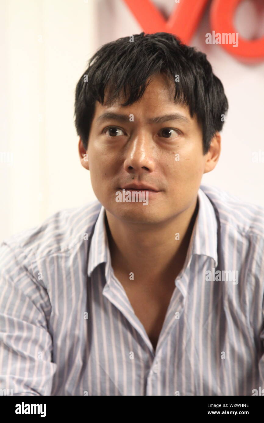 --FILE--American actor Archie David Kao listens during an interview in ...