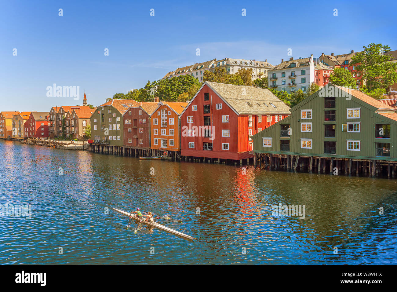 Double scull boat on Nidelva river. View from Old Town bridge. Trondheim. Trondelag county. Norway Stock Photo