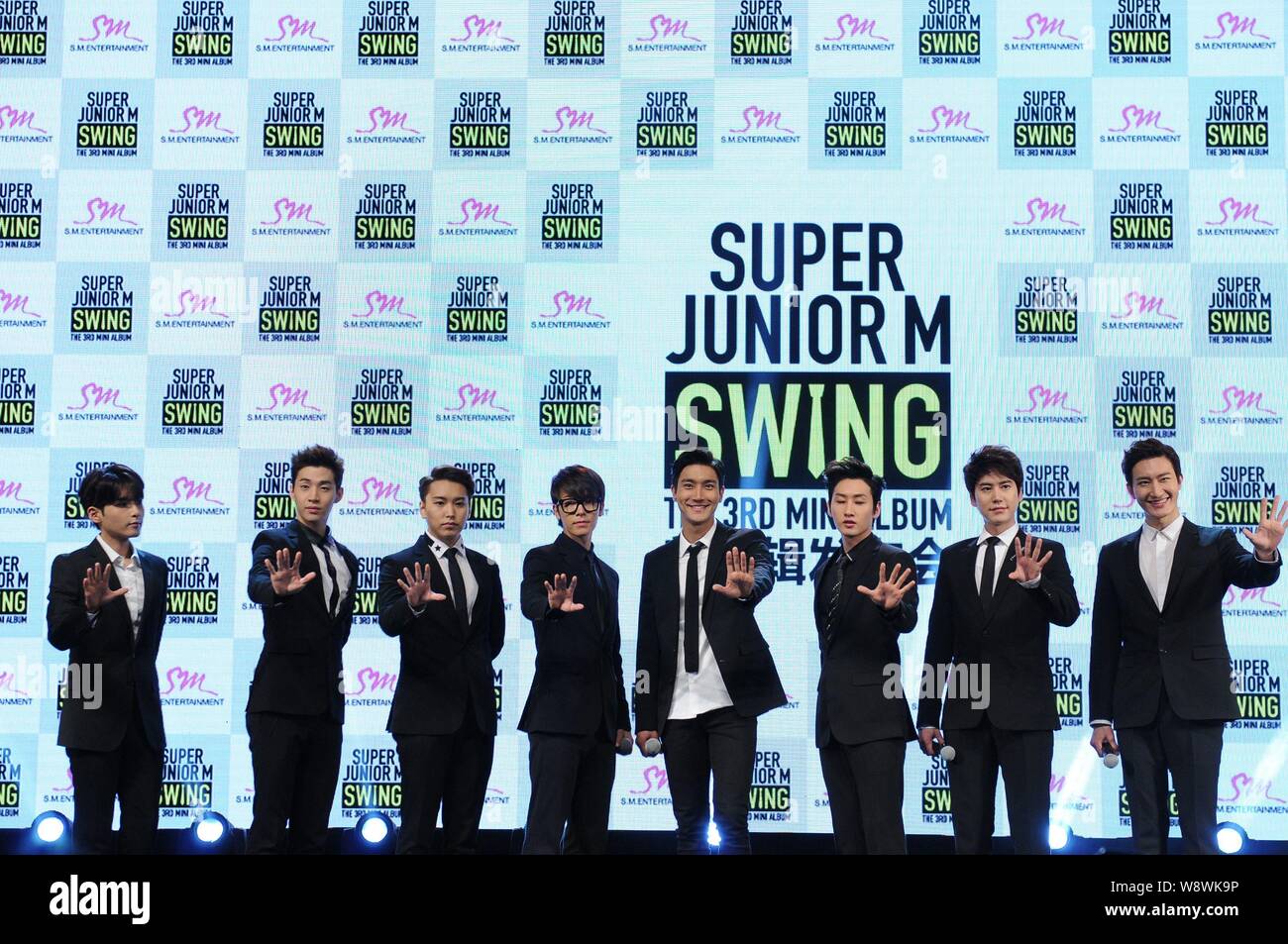 Members Of Super Junior M Pose During A Press Conference For Their New Album Swing In Beijing China 22 March 14 Stock Photo Alamy