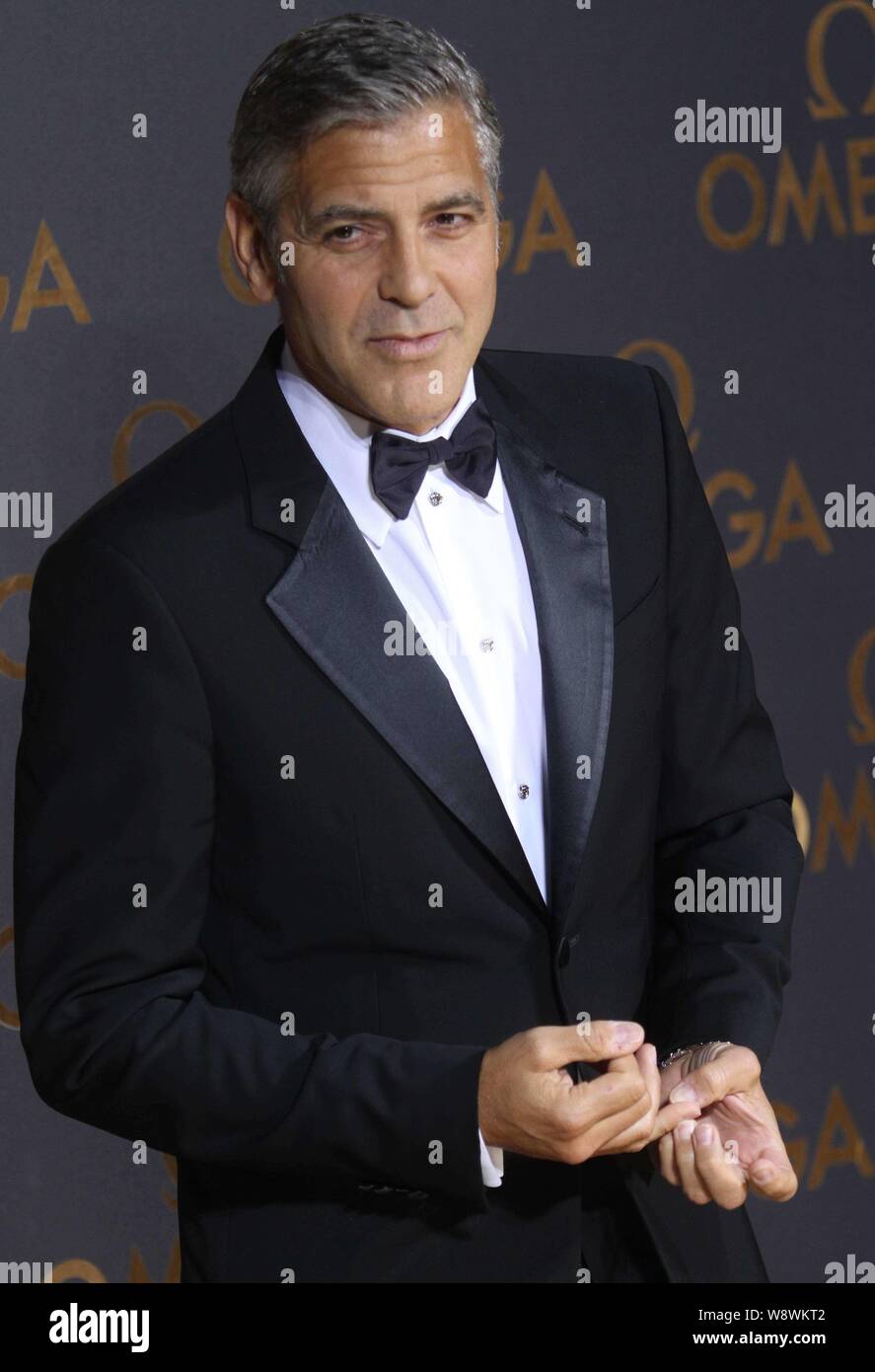 American actor George Clooney poses as he arrives at the Omega Le Jardin Secret party in Shanghai, China, 16 May 2014.   Hollywood actor George Cloone Stock Photo
