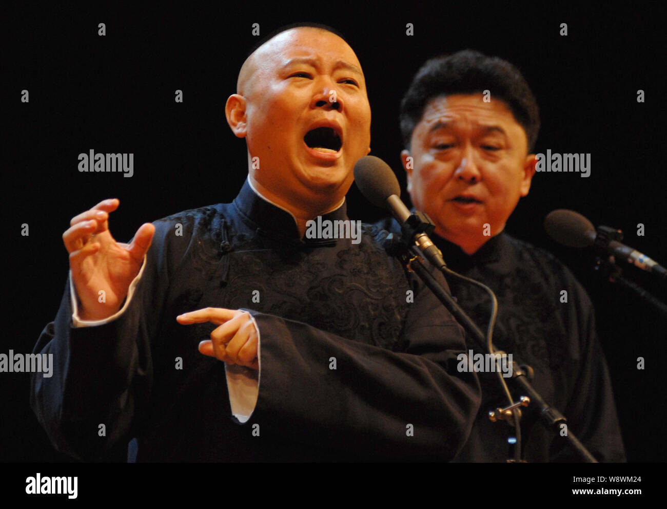 FILEChinese comedian and crosstalk actor Guo Degang, left, performs