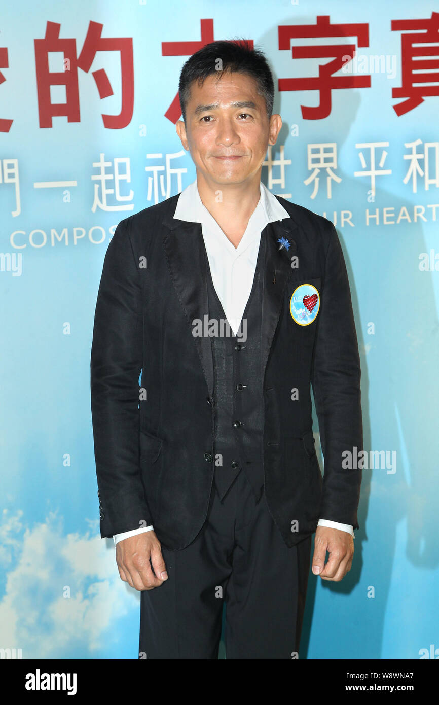 Hong Kong actor Tony Leung Chiu Wai attends the 10th Anniversary Hong Kong Kagyu Monlam in Hong Kong, China, 9 September 2014. Stock Photo