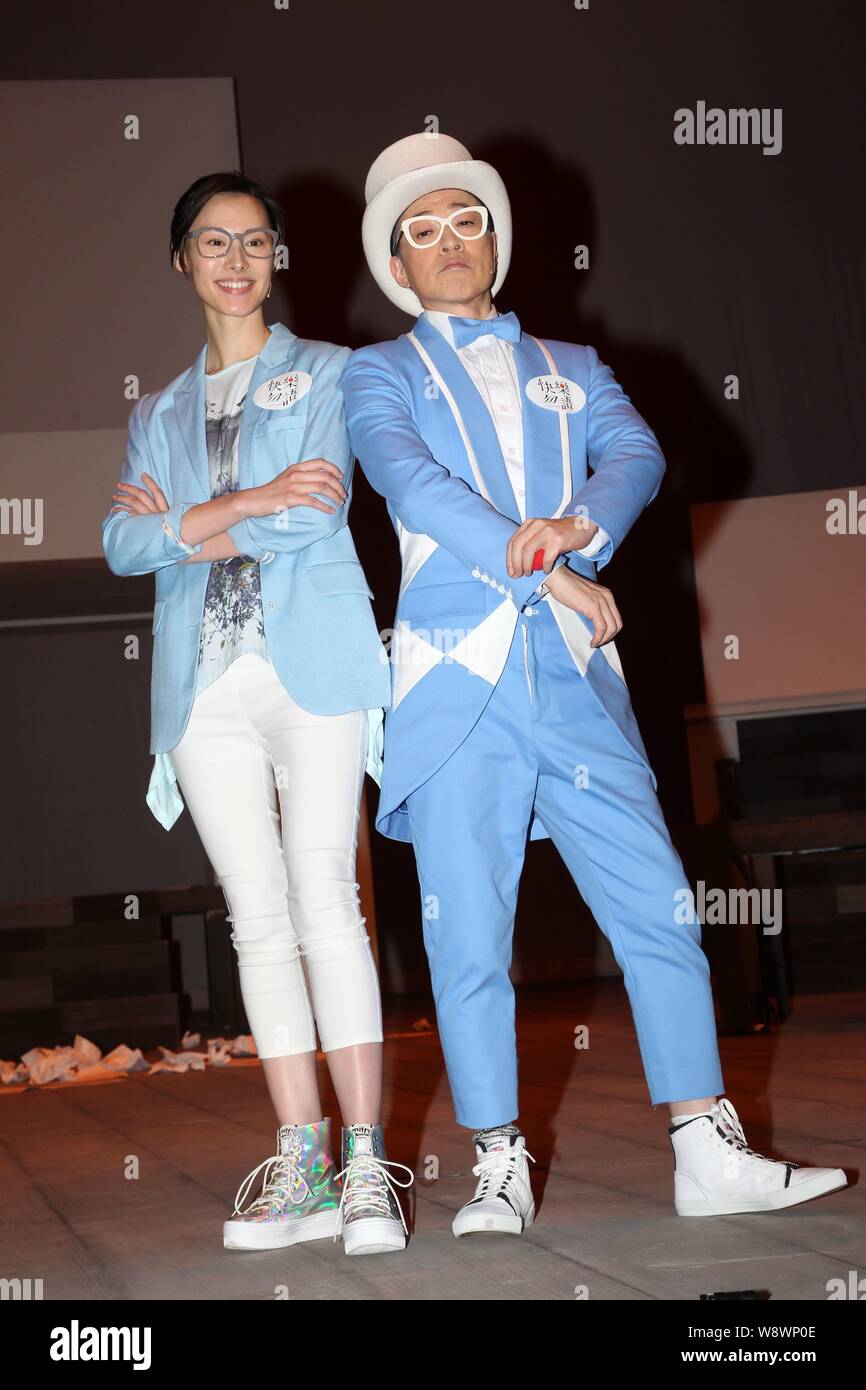 Hong Kong actress Isabella Leong, left, and Hong Kong actor Jim Chim pose during a rehearsal for their theatre drama, Sign of Happiness, in Hong Kong, Stock Photo