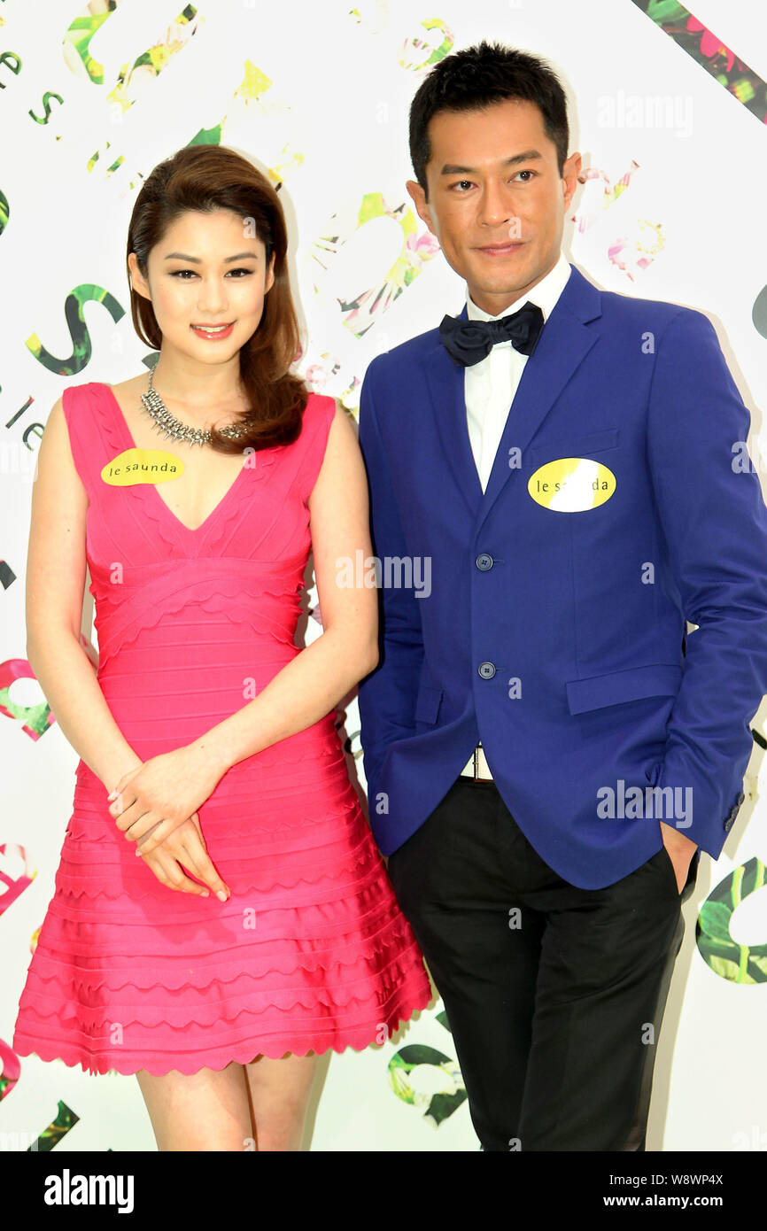 Hong Kong actor Louis Koo, right, and Canadian actress Eliza Sam pose