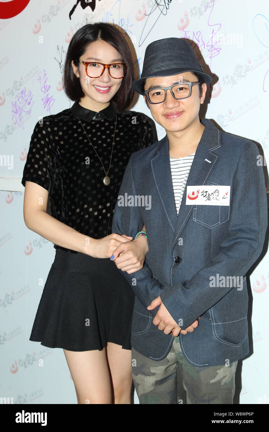 Hong Kong Actress Leanne Li Left And Actor Wong Cho Lam Pose During The Opening Event For The Hotpot Restaurant Of Former Hong Kong Actress Anna Uey Stock Photo Alamy