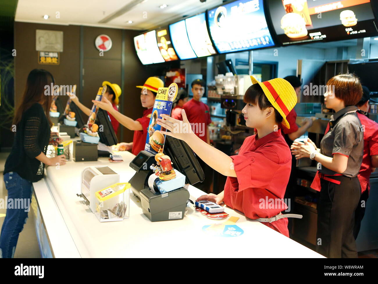 Employees Dressed In Luffy Costumes Serve Customers At The One Piece Themed Mcdonalds Fastfood Restaurant In Guangzhou City South Chinas Guangdong Pr Stock Photo Alamy