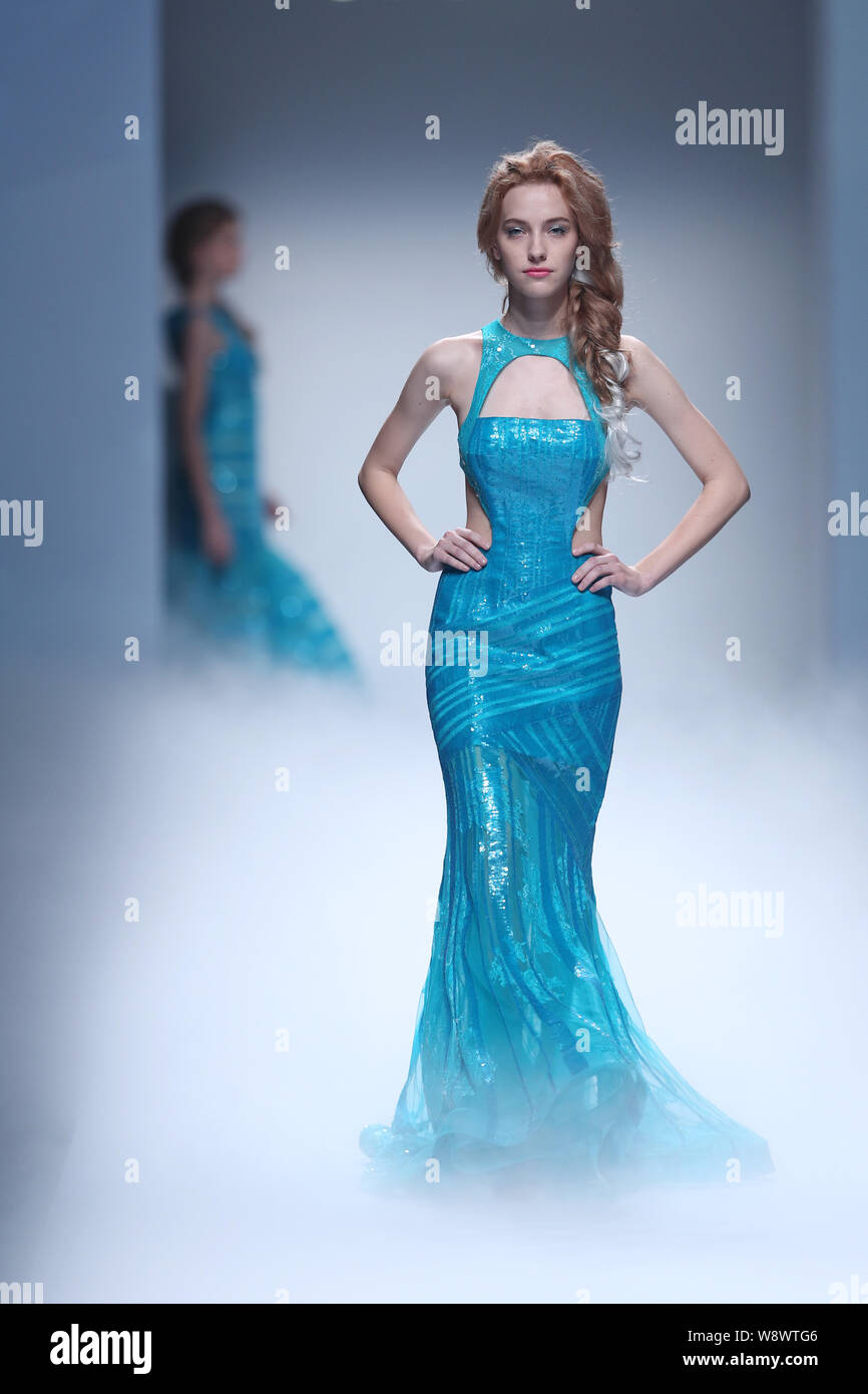 A model displays a new creation at the fashion show of Disney Princess Collection By WTC during the Shanghai Fashion Week Spring/Summer 2015 in Shangh Stock Photo - Alamy A model displays a new creation at the fashion show of Disney Princess Collection By WTC during the Shanghai Fashion Week Spring/Summer 2015 in Shangh Stock Photo - Alamy