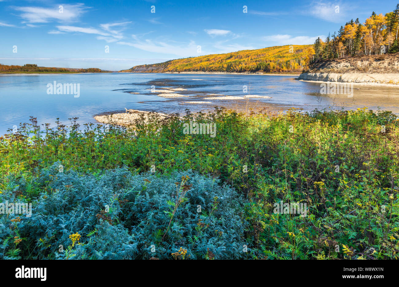 Autumn view of the junction or confluence of the Athabasca and Clearwater rivers at Fort McMurray, Alberta Canada. Stock Photo