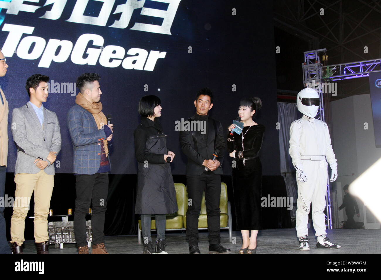 Taiwanese singer and actor Richie Jen, third right, is interviewed at the launch event for the reality TV show 'Top Gear' in Shanghai, China, 12 Novem Stock Photo