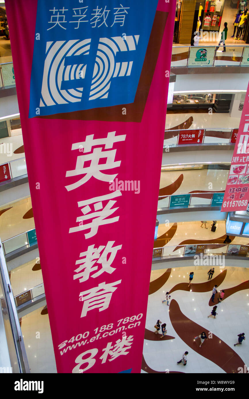 FILE--An advertisement for EF (Education First) English training is  pictured in Shanghai, China, 24 May 2013. Though there has been a steady  gro Stock Photo - Alamy