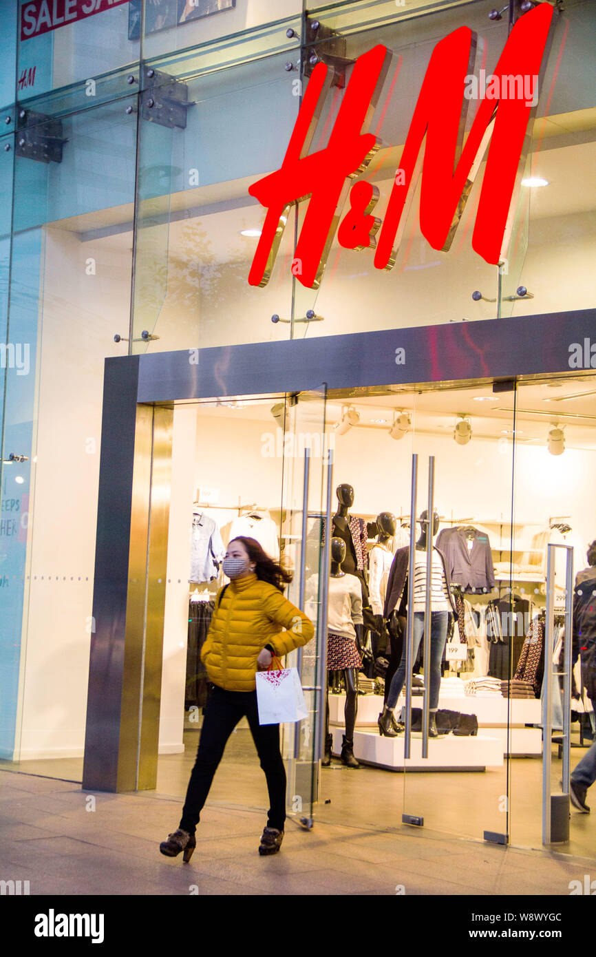 --FILE--A customer leaves a store of H&M in Shanghai, China, 26 ...
