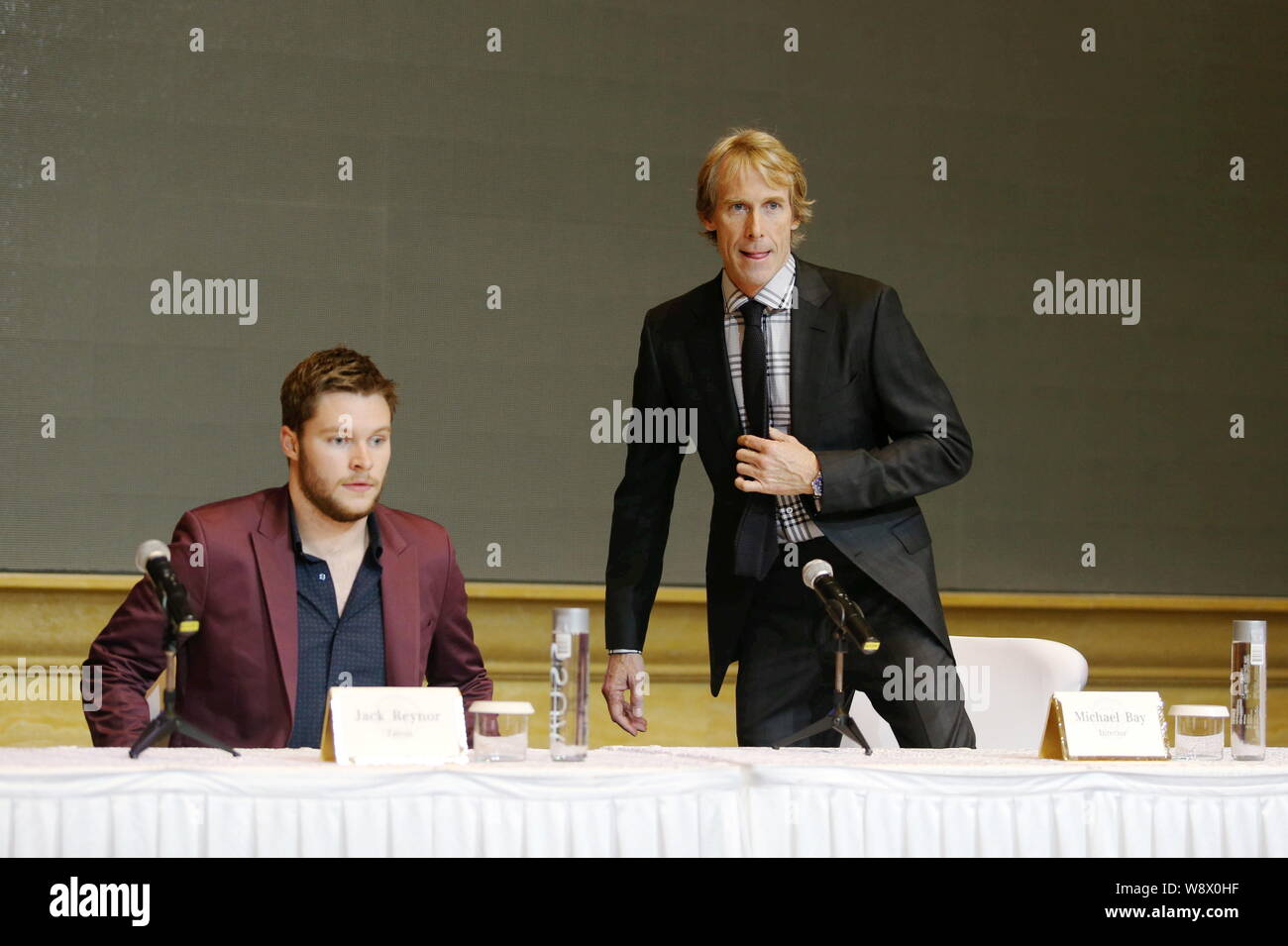 Irish-American actor Jack Reynor, left, and American director Michael Bay attend a press conference for the Beijing premiere of their new movie, Trans Stock Photo