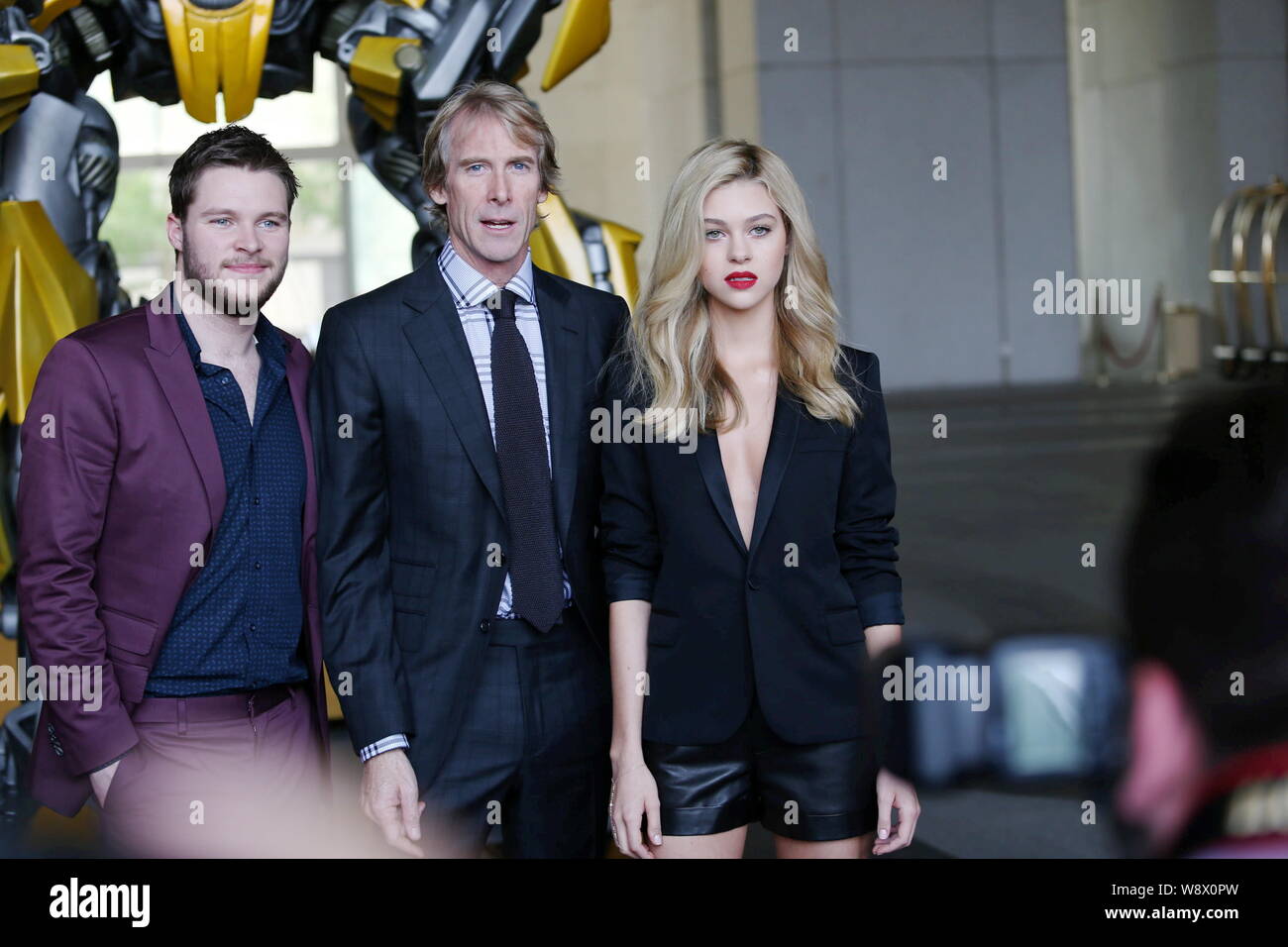 (From left) Irish-American actor Jack Reynor, American director Michael Bay and actress Nicola Peltz pose at a press conference for the Beijing premie Stock Photo