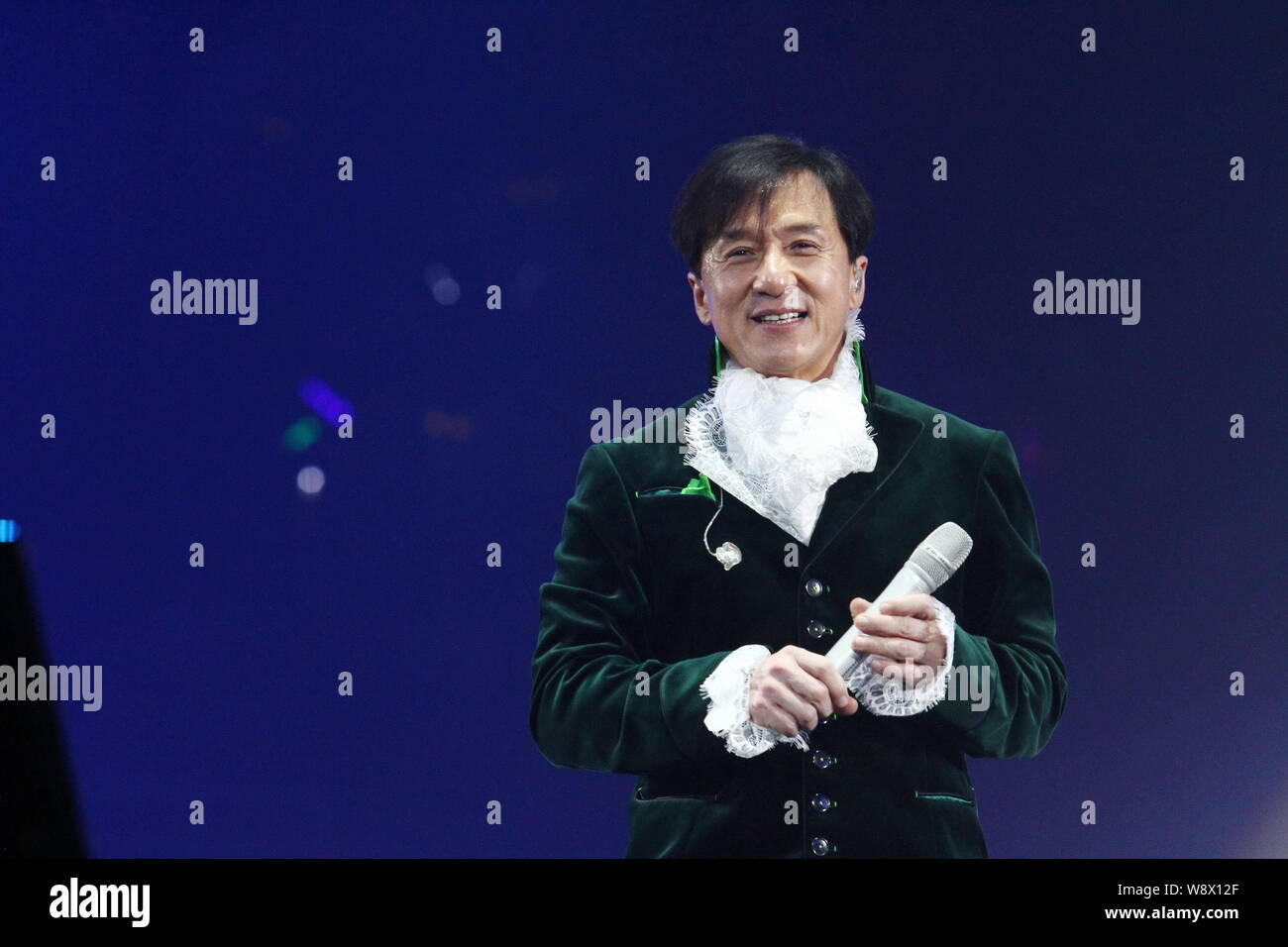 Hong Kong actor Jackie Chan performs during a stars concert to