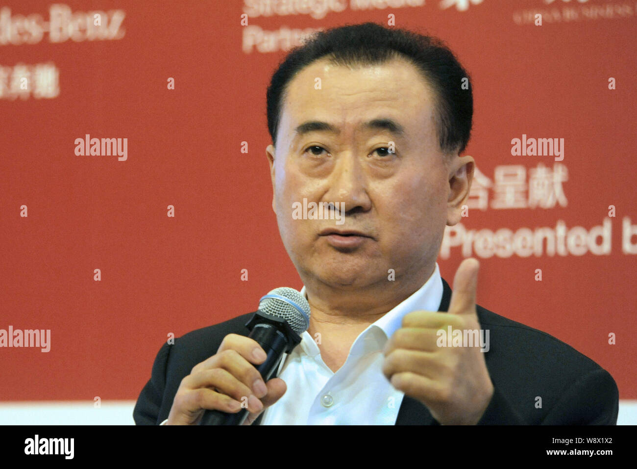 Wang Jianlin, Chairman of Dalian Wanda Group, speaks during a Master Class to mark the 20th anniversary of the China Europe International Business Sch Stock Photo