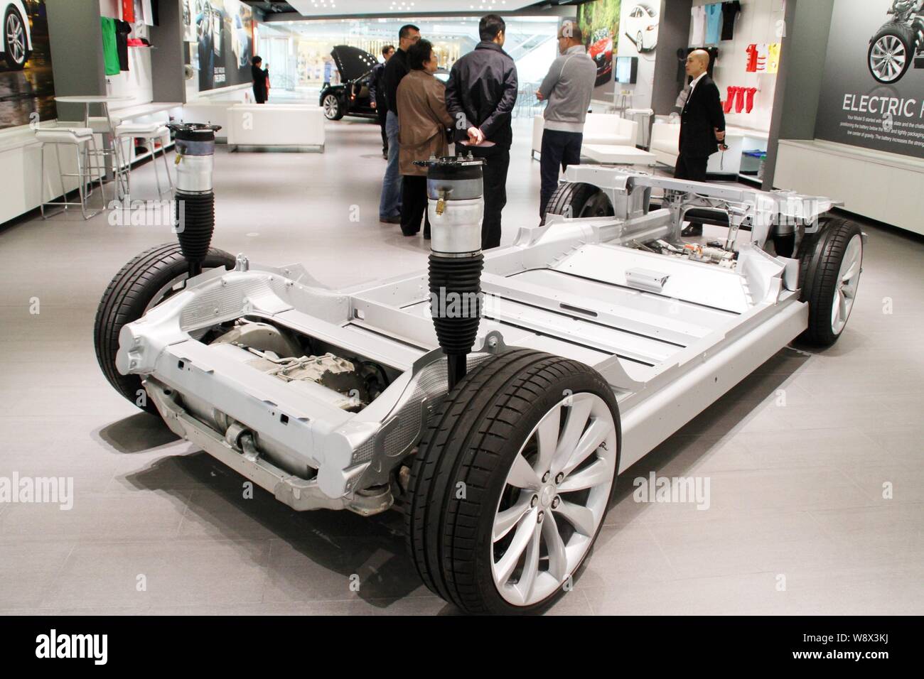 --FILE--A chassis of the Model S electric car is displayed at the Tesla store in Beijing, China, 6 November 2013.   Tesla Motors Inc., the youngest an Stock Photo