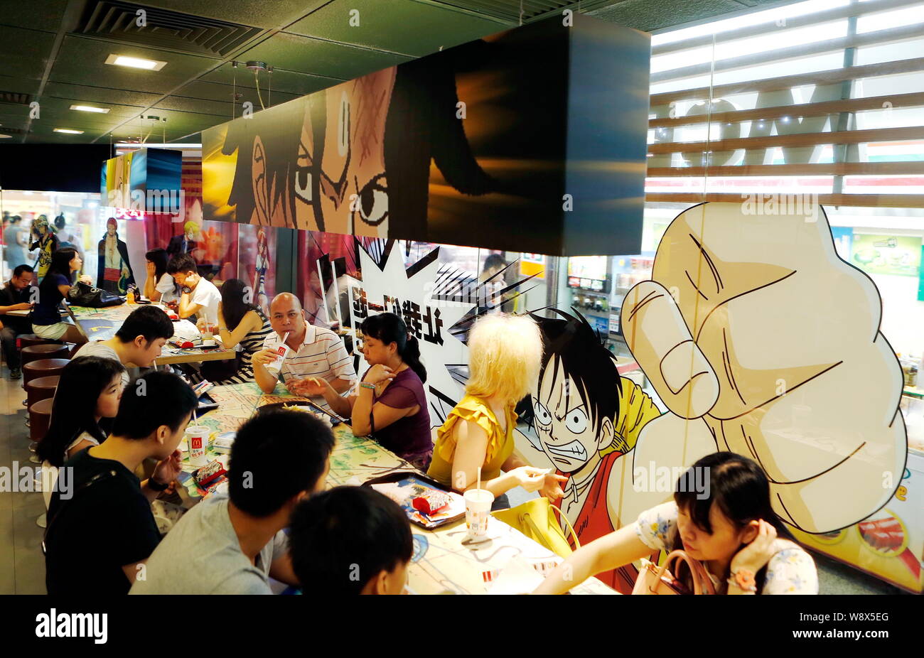 Customers Eat At The One Piece Themed Mcdonalds Fastfood Restaurant In Guangzhou City South Chinas Guangdong Province 18 July 14 A Mcdonalds Fa Stock Photo Alamy