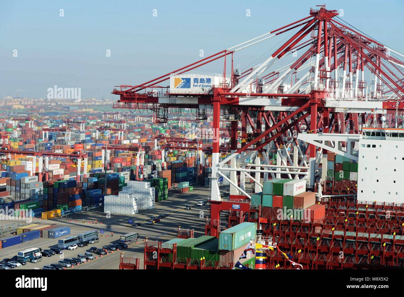 Stacks of Containers are seen at the Port of Qingdao in Qingdao city, east China's Shandong province, 8 December 2014.   China's imports shrank unexpe Stock Photo