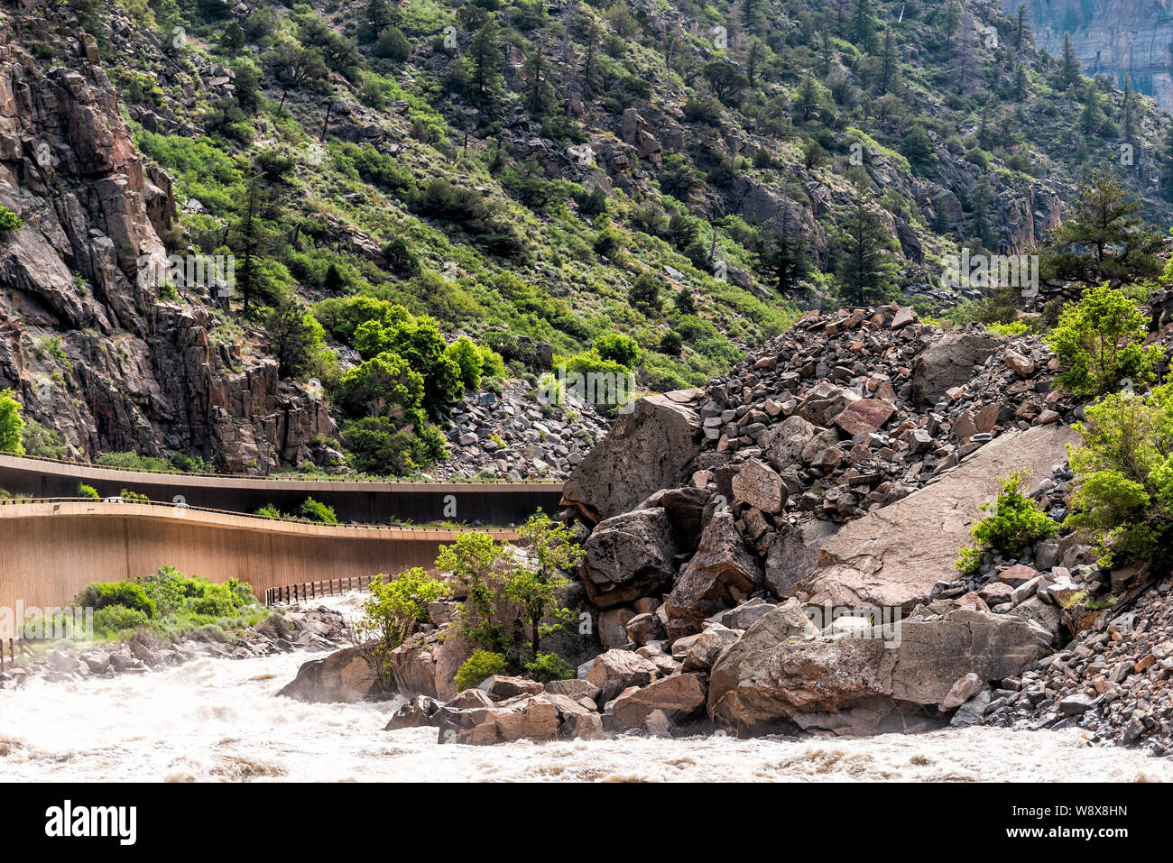 Glenwood Springs Canyon on highway through Colorado towns with cliffs