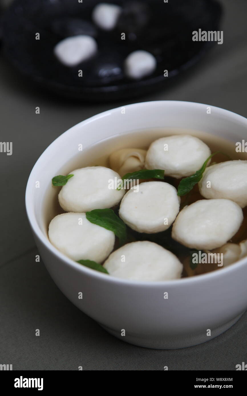 A bowl of fish ball soup is served at a restaurant in Qingdao city, east Chinas Shandong province, 15 October 2011. Stock Photo