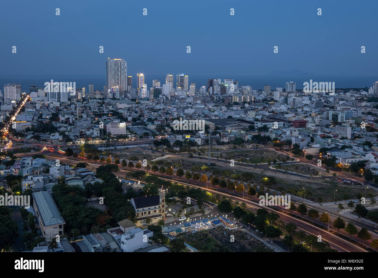 Overview of Danang city at dusk and night time, Vietnam Stock Photo