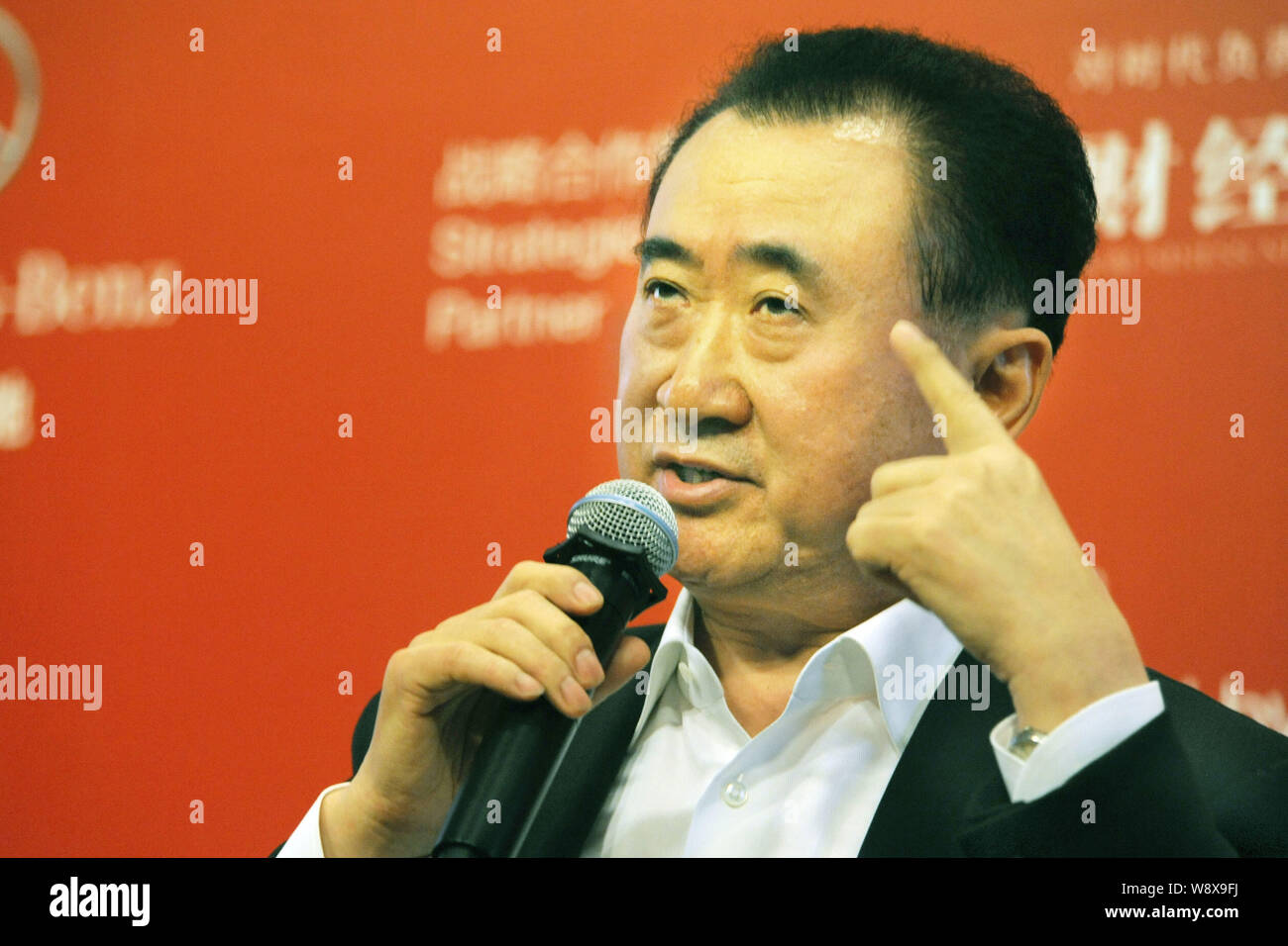 Wang Jianlin, Chairman of Dalian Wanda Group, speaks during a Master Class to mark the 20th anniversary of the China Europe International Business Sch Stock Photo