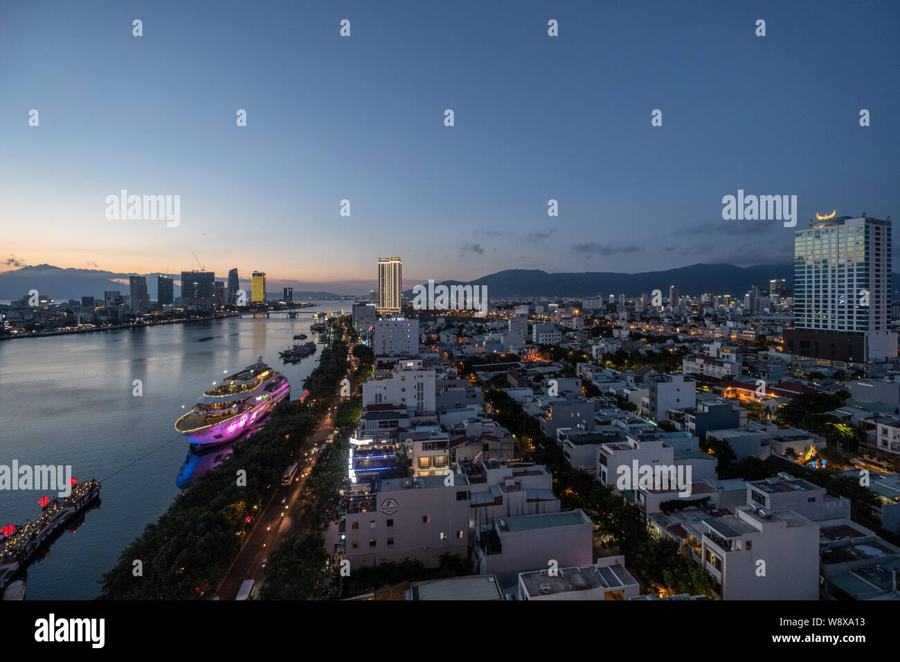 Overview of Danang city by night, central Vietnam Stock Photo