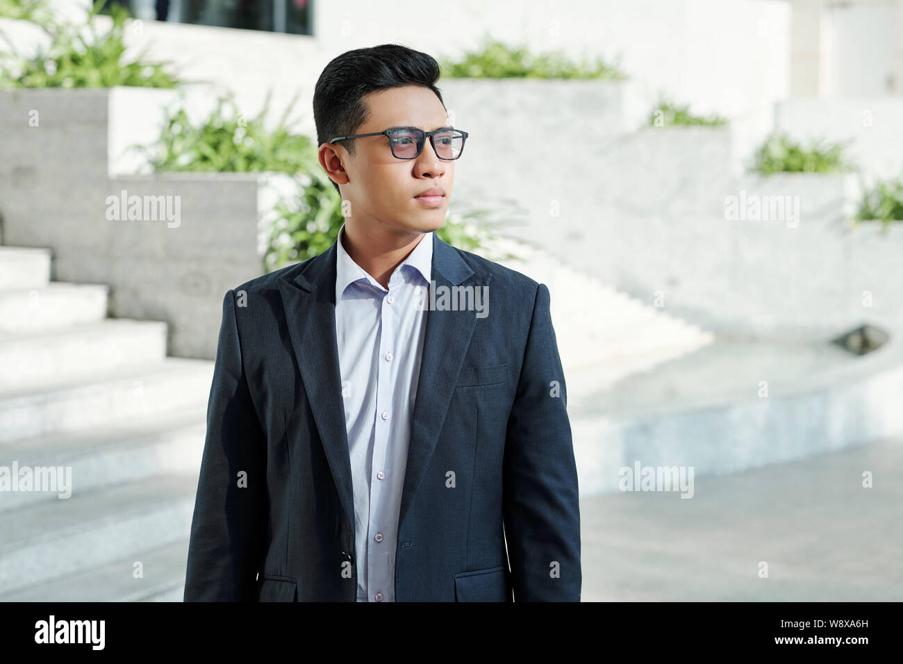 Young pensive entrepreneur Stock Photo