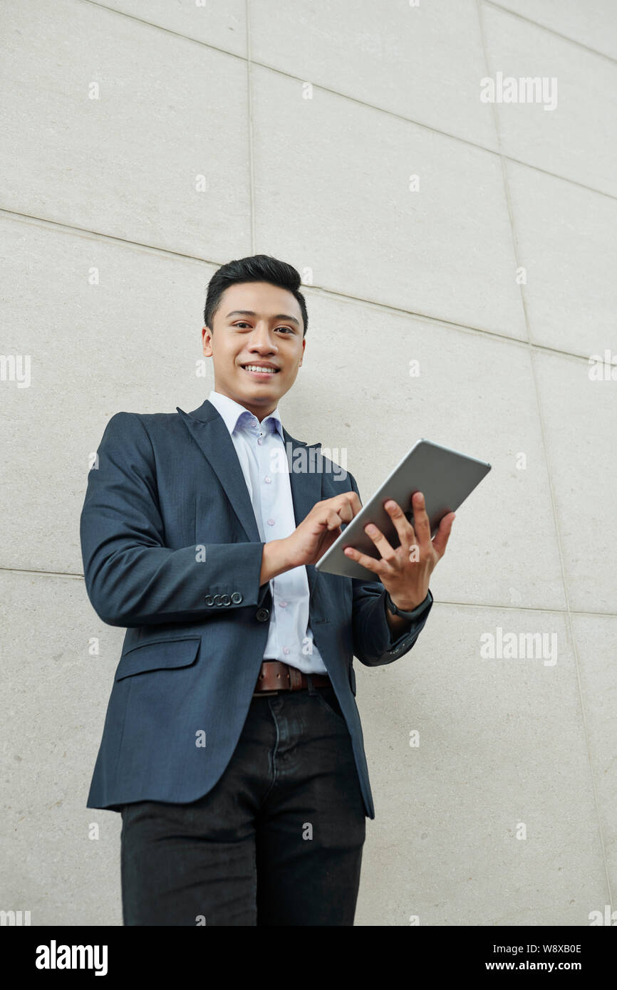 Businessman working on digital tablet Stock Photo