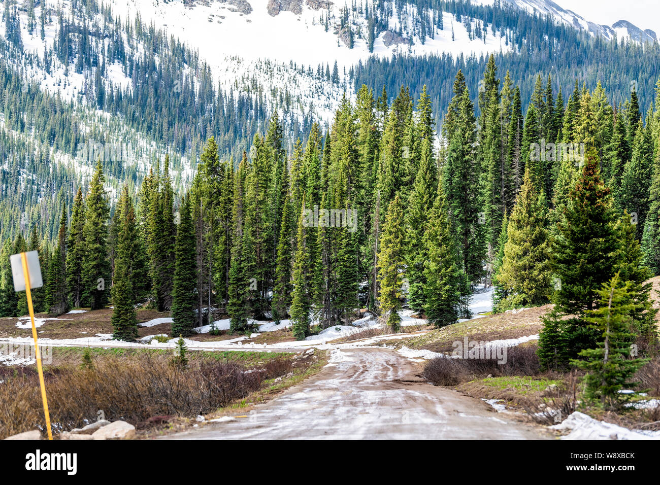 Crested Butte Kebler Pass snow slippery dirt road in rocky mountains in