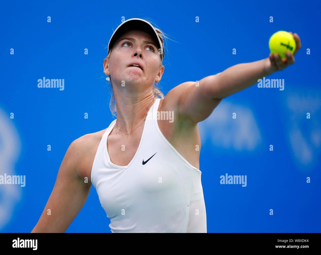 Maria Sharapova of Russia serves against Timea Bacsinszky of Switzerland  during the women's singles third round of the 2014 WTA Wuhan Open tennis  tour Stock Photo - Alamy