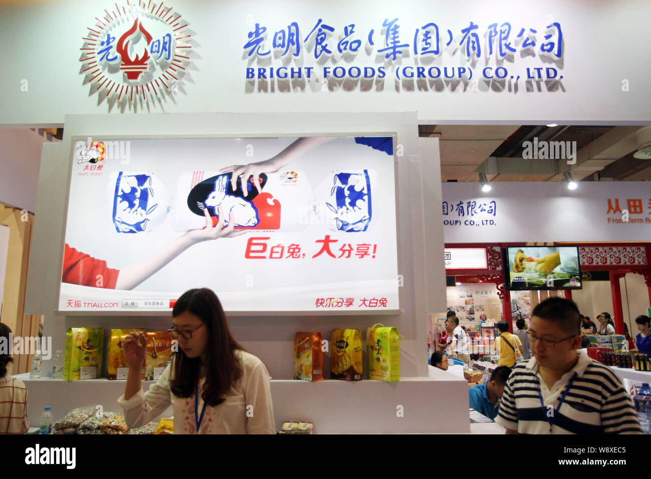 FILEChinese employees are seen at the stand of Bright Foods (Group