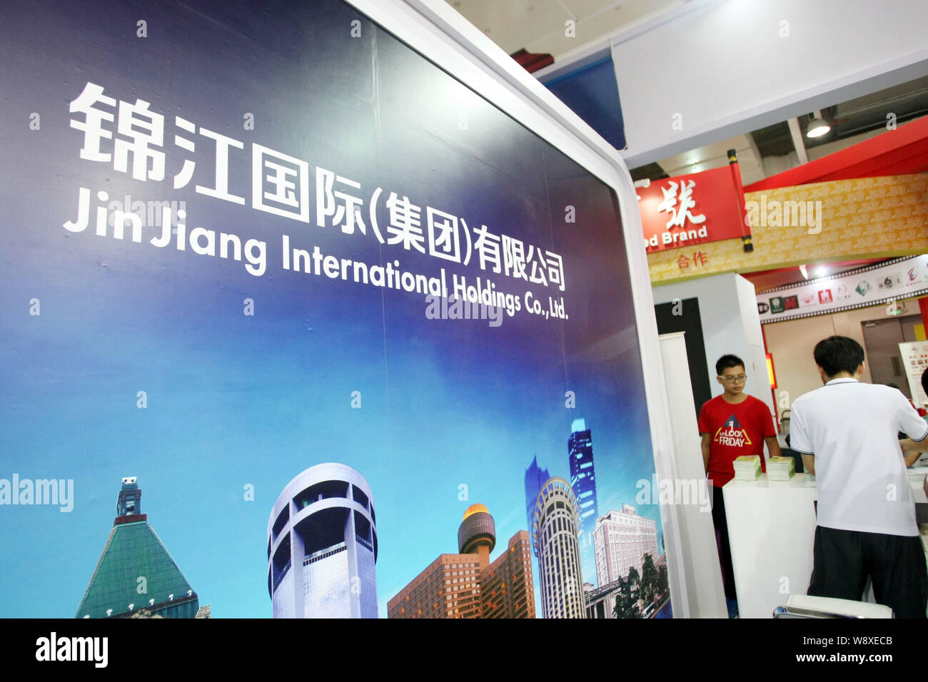 --FILE--View of the stand of Shanghai Jin Jiang International Holdings Co. Ltd. during a fair in Shanghai, China, 29 September 2014.   Shanghai Jin Ji Stock Photo