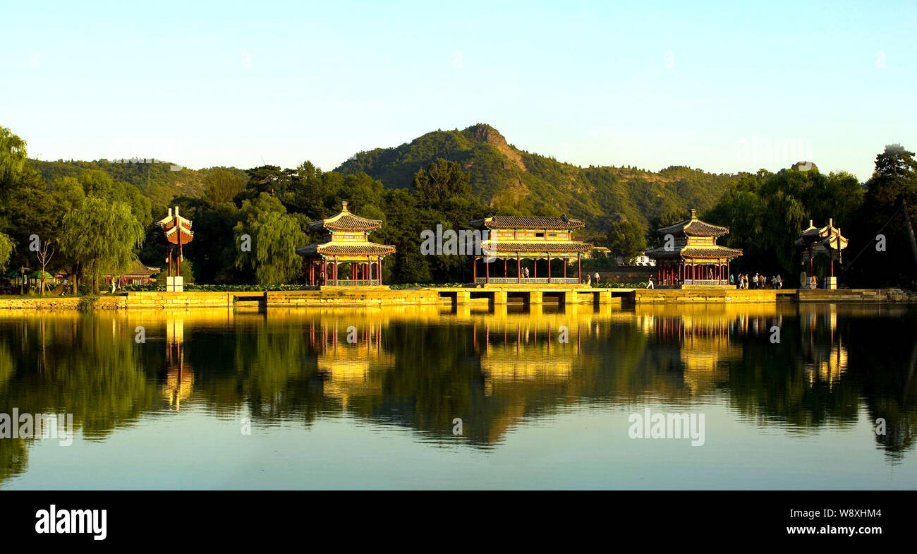 View of pavilions by a lake at the Chengde Mountain Resort in Chengde city, north Chinas Hebei province. Stock Photo