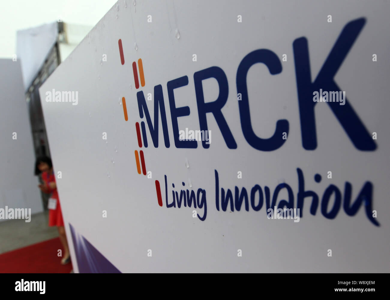 A logo of Merck is pictured during the groundbreaking ceremony of Merck China Nantong Pharmaceutical Manufacturing Facility in Nantong city, east Chin Stock Photo