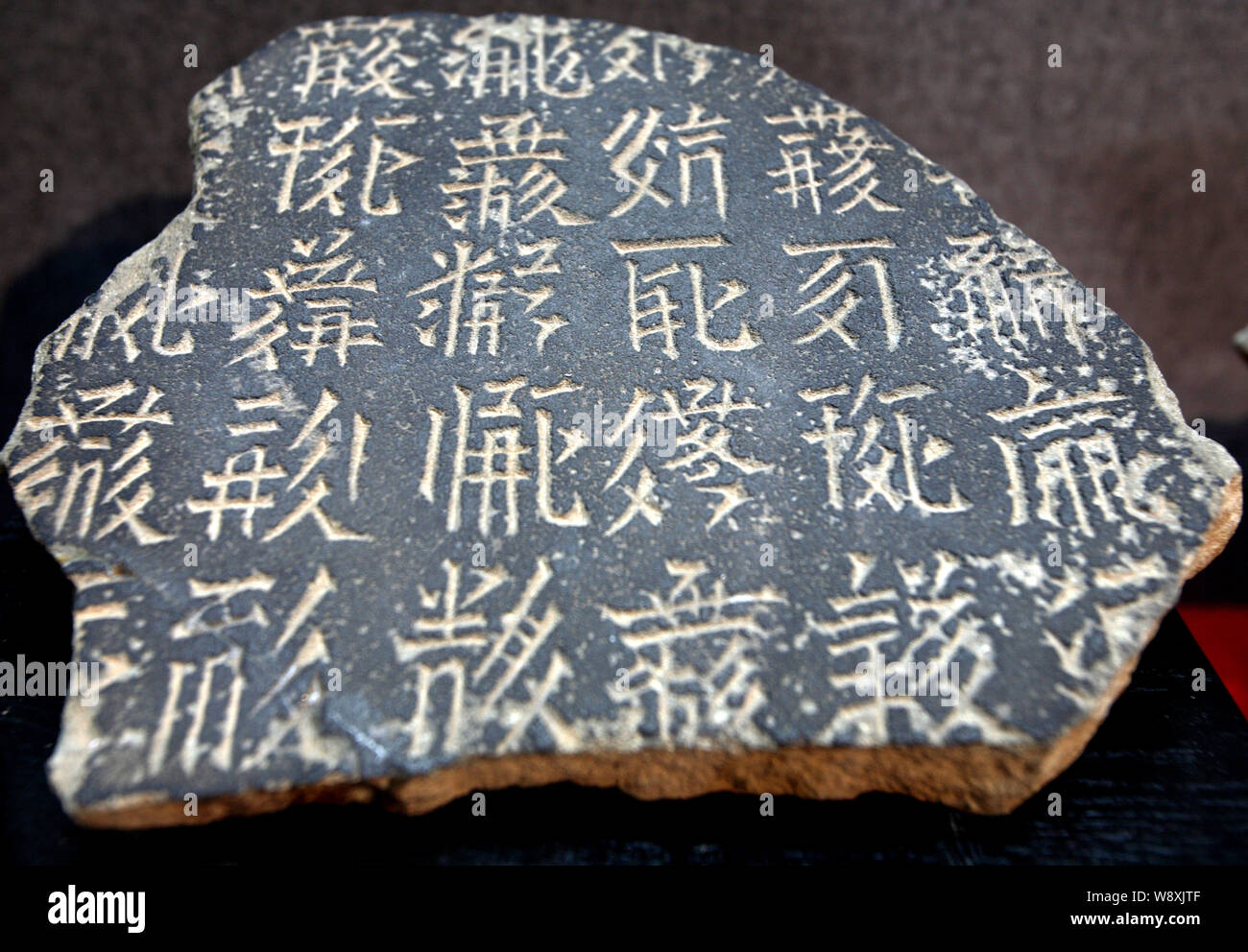 Part of an inscription of Tangut characters is displayed during an exhibition at a Museum in Hangzhou city, east China's Zhejiang province, 28 Septemb Stock Photo