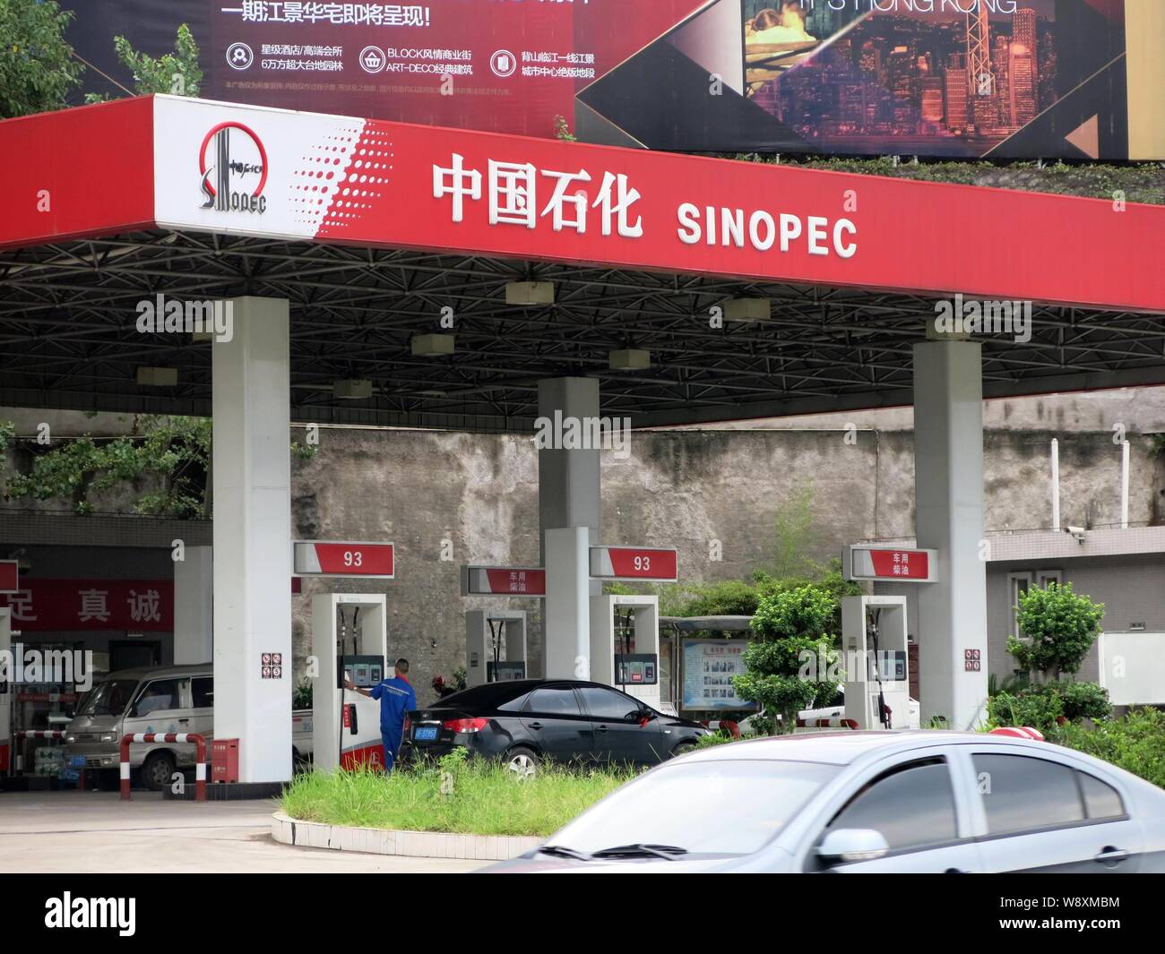 Cars are being refueled at a gas station of Sinopec in Yunyang county, Chongqing, China, 23 March 2014.   China Petroleum and Chemical Corporation (Si Stock Photo