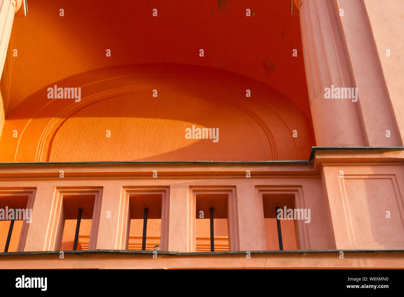 Pink colored balcony in a house in sunlight Stock Photo - Alamy