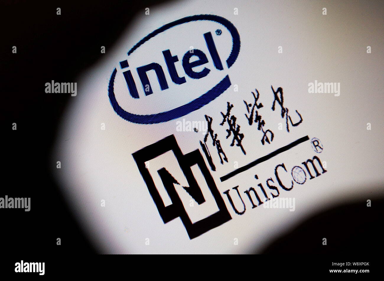 A Chinese netizen browses the logos of Intel and UnisCom of Tsinghua ...