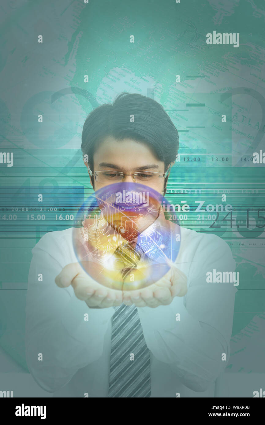 Businessman with a globe of circuits Stock Photo