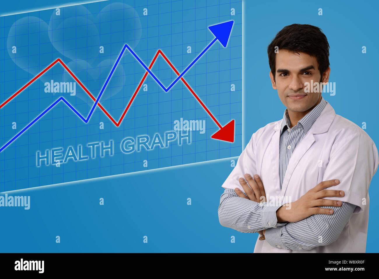 Male doctor standing with his arms crossed Stock Photo
