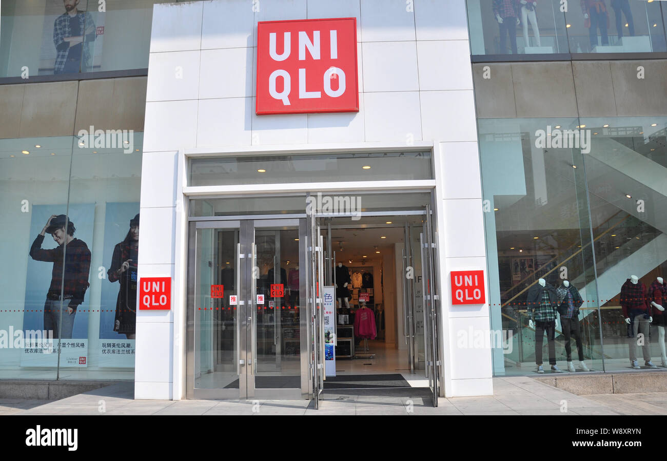 FILE--View of a store of Uniqlo in Shenyang city, northeast Chinas Liaoning  province, 5 September 2014. Japan's Fast Retailing is expanding the Stock  Photo - Alamy