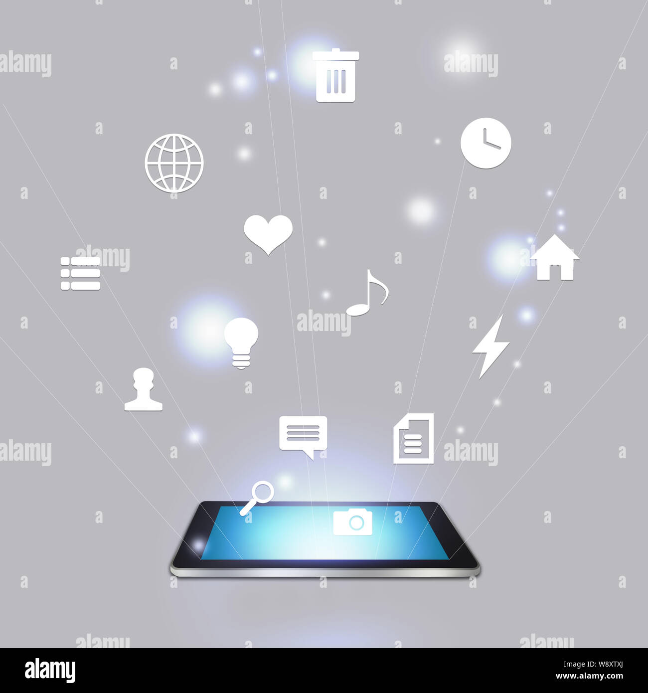 Close up of a digital tablet and icons emitting from it Stock Photo