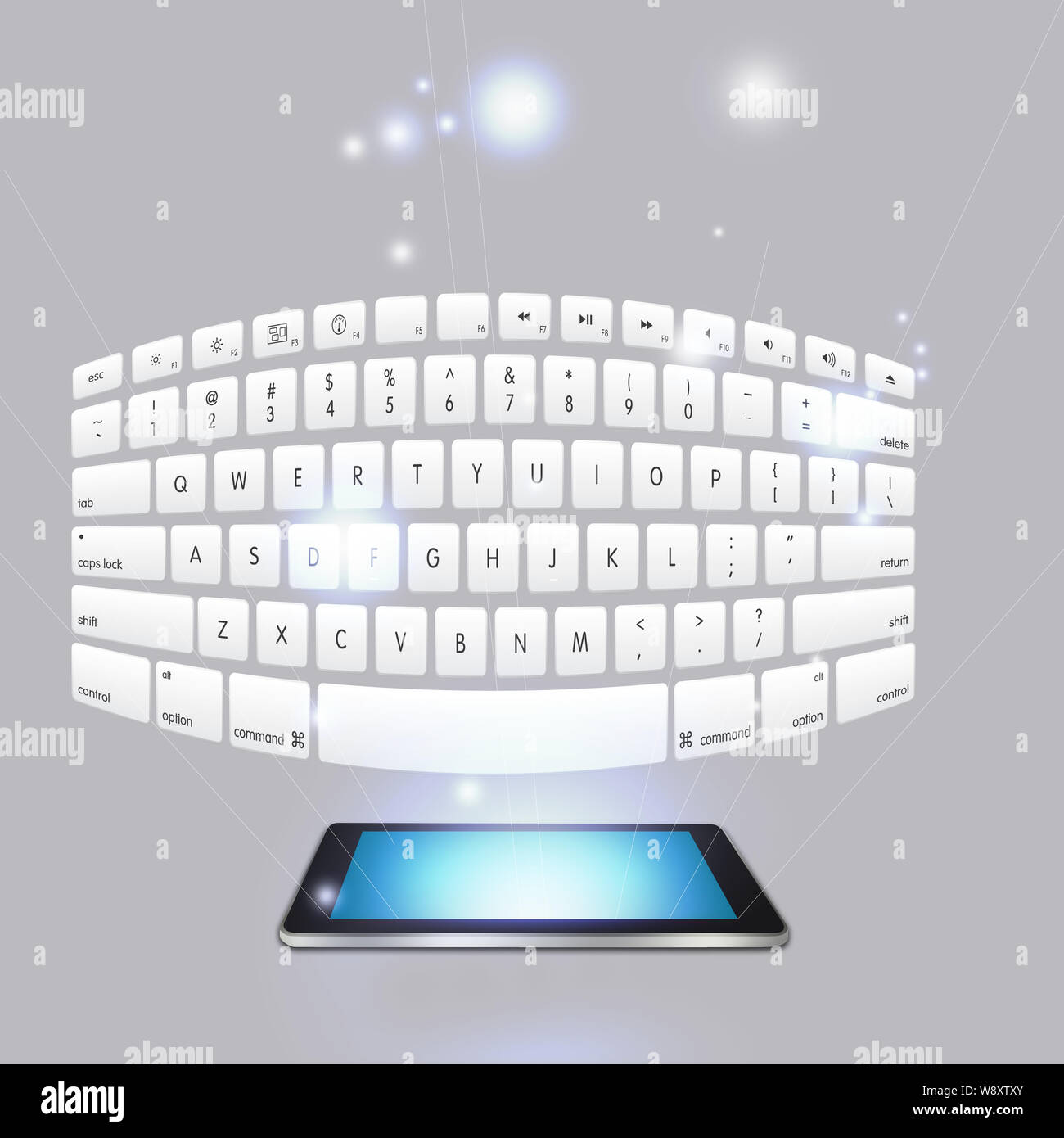 Digital tablet and keyboard emitting from it Stock Photo Alamy