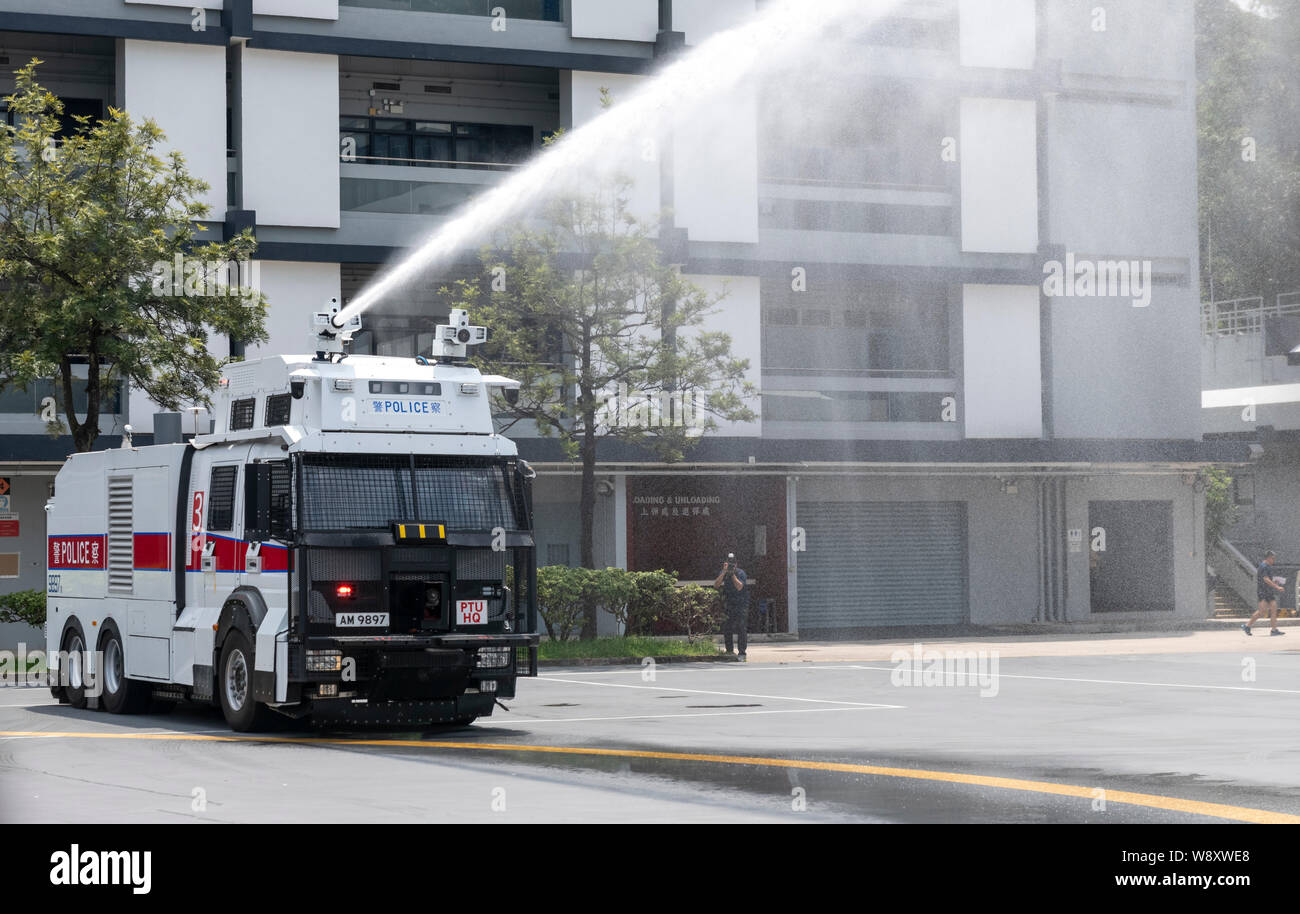 HONG KONG,HONG KONG SAR,CHINA:August 12th,2019. The Hong Kong Police department arrange for members of the Legislative Council’s Panel on Security to observe a demonstration of specialised crowd management vehicles (water cannons) at the Police Tactical Unit (PTU)  The Hong Kong Police department is preparing to use the vehicles on the protests in the city. “© Jayne Russell/Alamy Live News Stock Photo