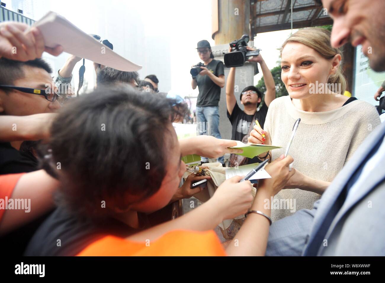 German Actress Martina Hill Second Right Signs Autographs For