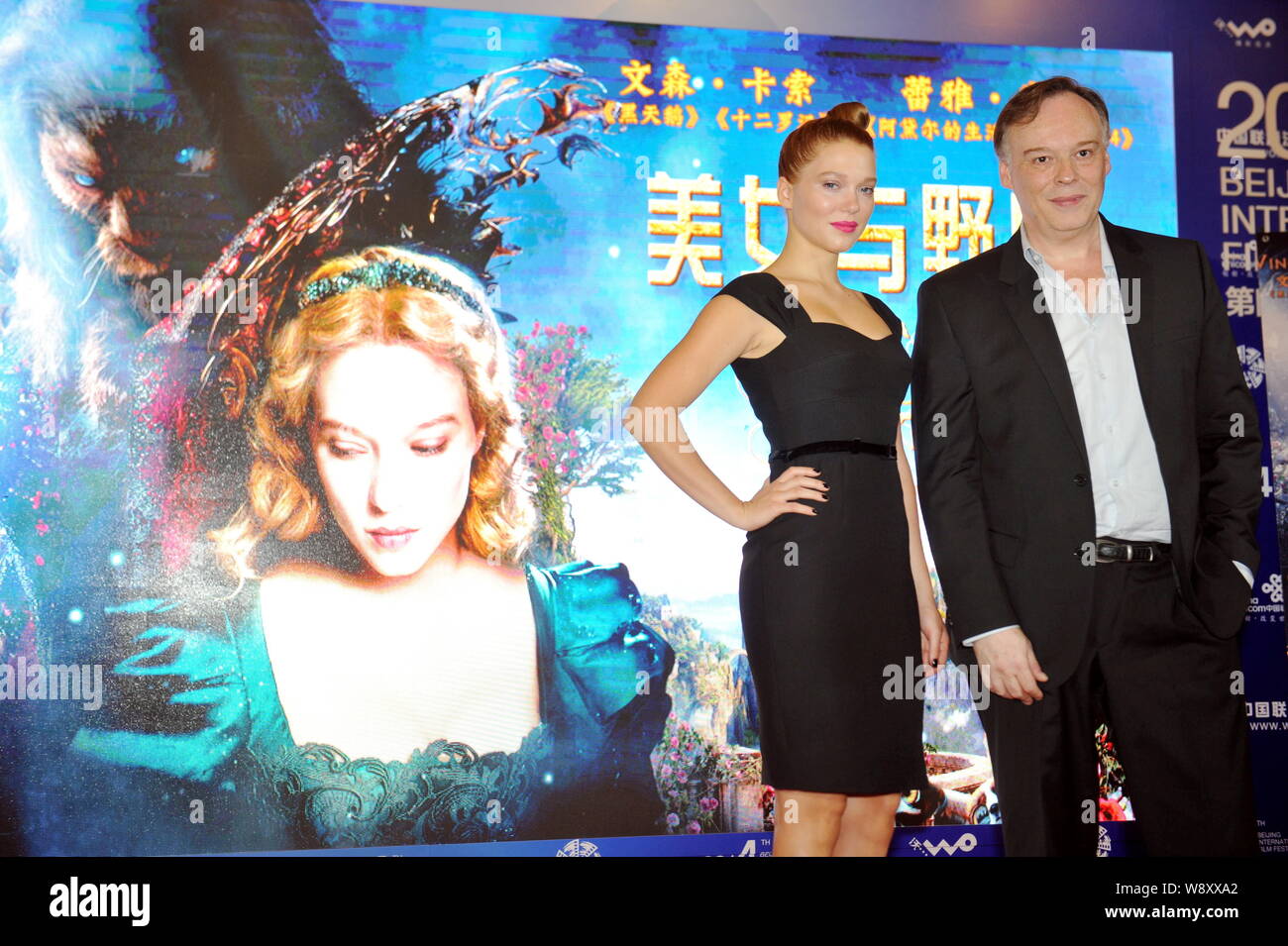 French actress Lea Seydoux, left, and director Christophe Gans pose during  a press conference for their movie, La Belle et la Bete (Beauty and the Bea  Stock Photo - Alamy