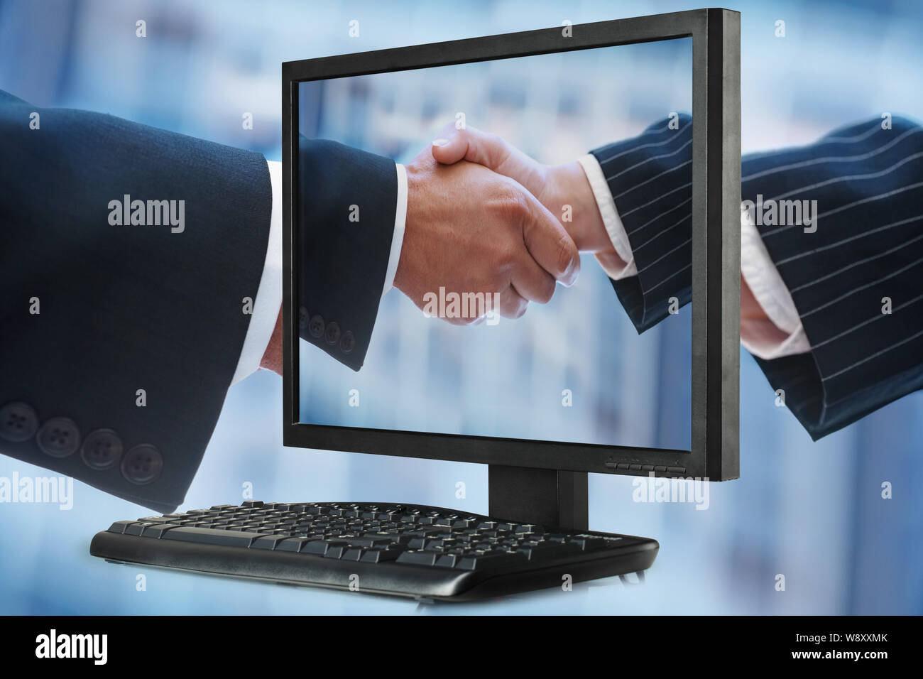 Two business executives shaking hands Stock Photo