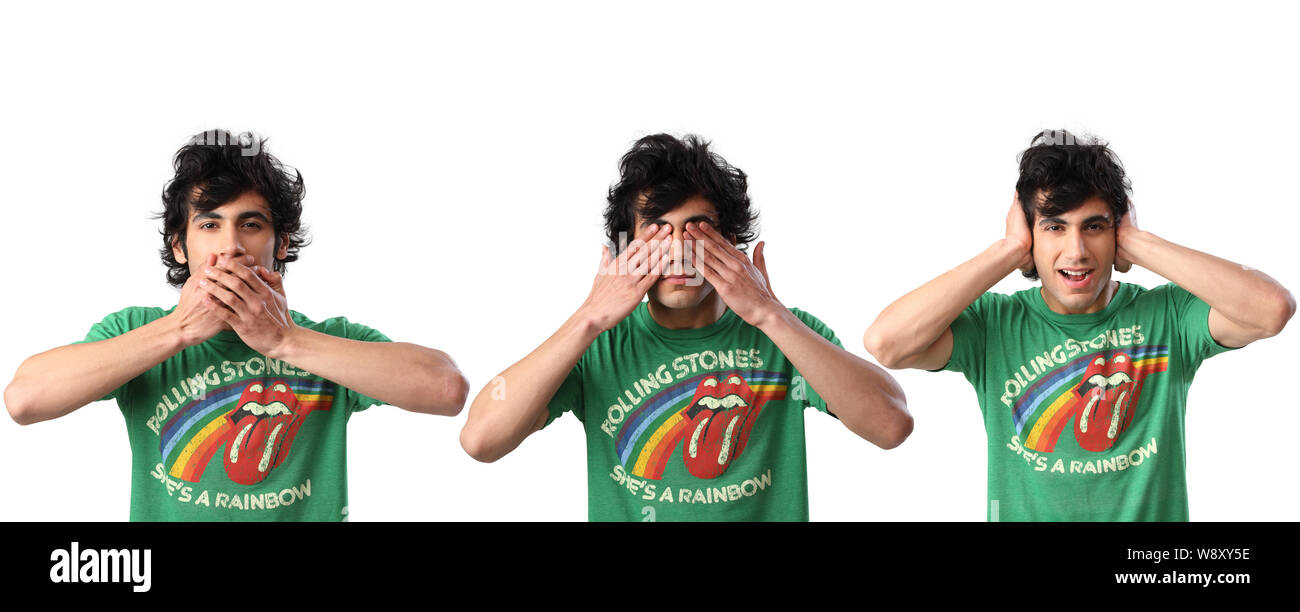 Man doing see no evil, hear no evil, speak no evil gesture Stock Photo