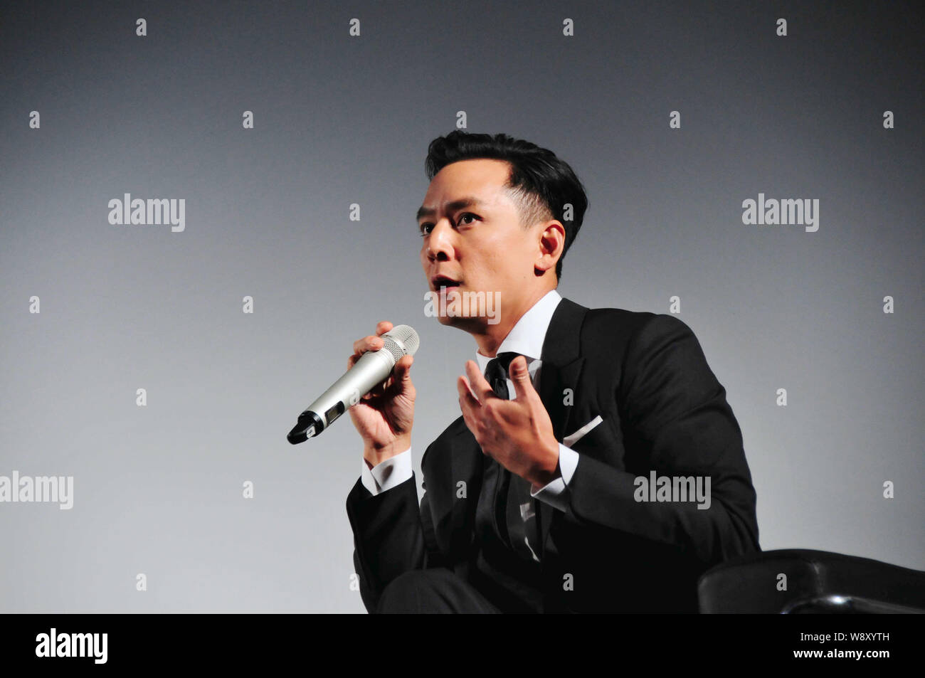Hong Kong actor Daniel Wu speaks at the premiere of his new micro movie, A Rose Reborn, in Shanghai, China, 22 October 2014. Stock Photo